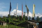 Mountain scenery and prayer flags on the Annapurna Sanctuary Trek. Image by A Gallop