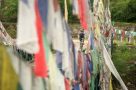 Prayer flags, cycling in Bhutan
