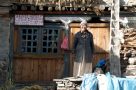 Local outside a Village house, Naar Phu. Image by J Davies